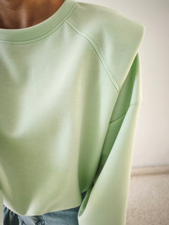Sudadera hombrera aguamarina