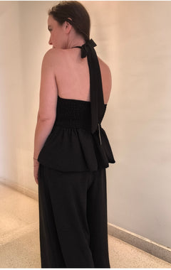 Top halter peplum abullonado