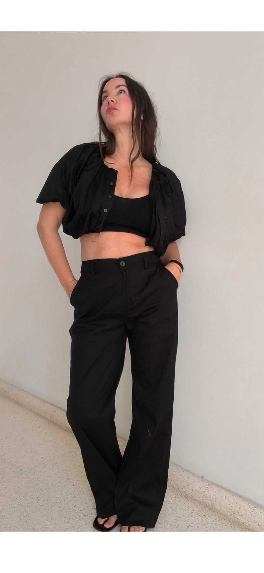 Conjunto negro abullonado